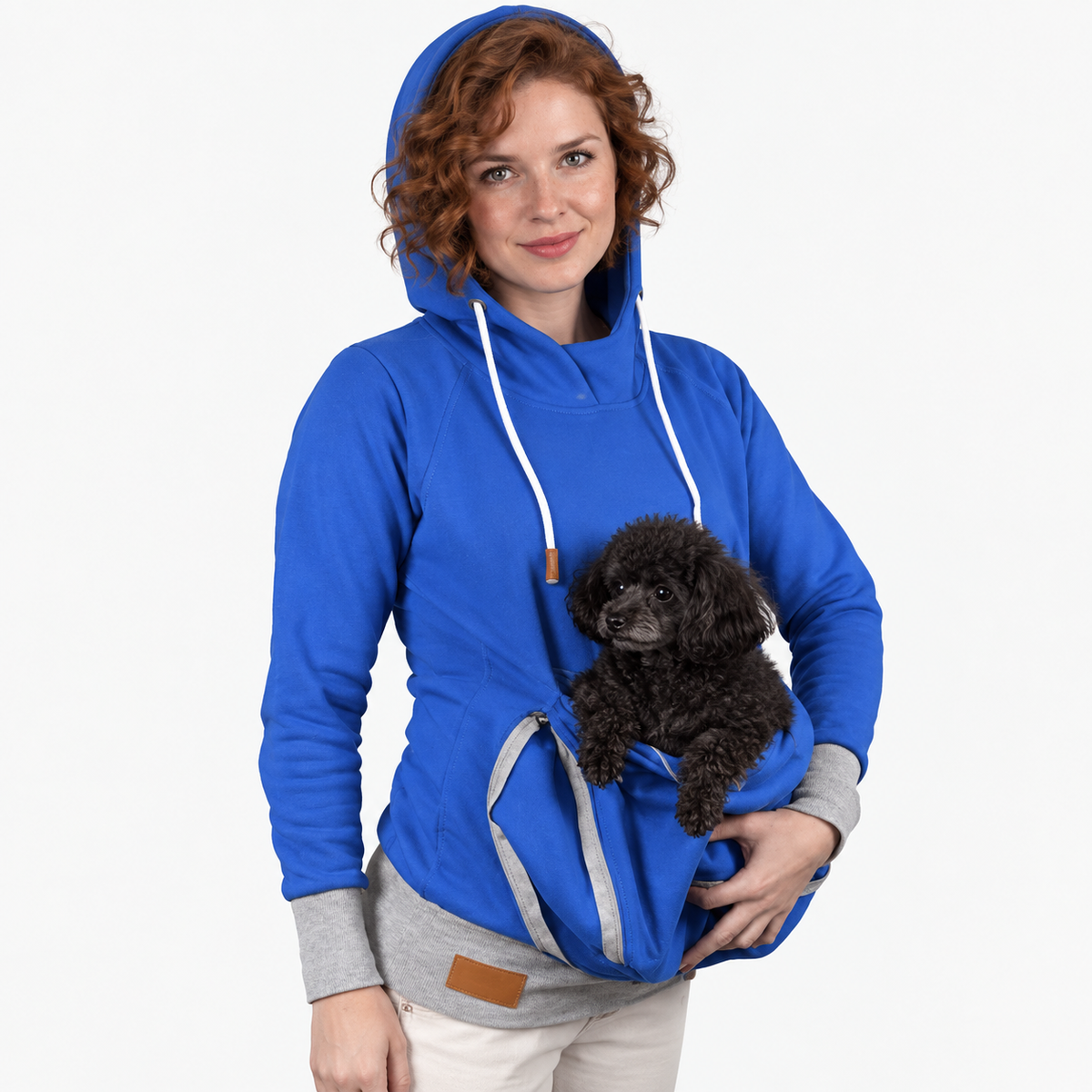 Pet carrier hoodie — hood-up view with a dog