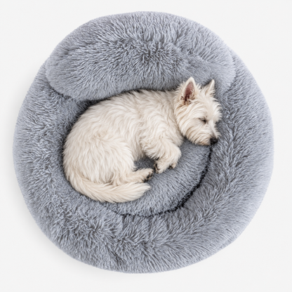Plush dog bed with sleeping dog