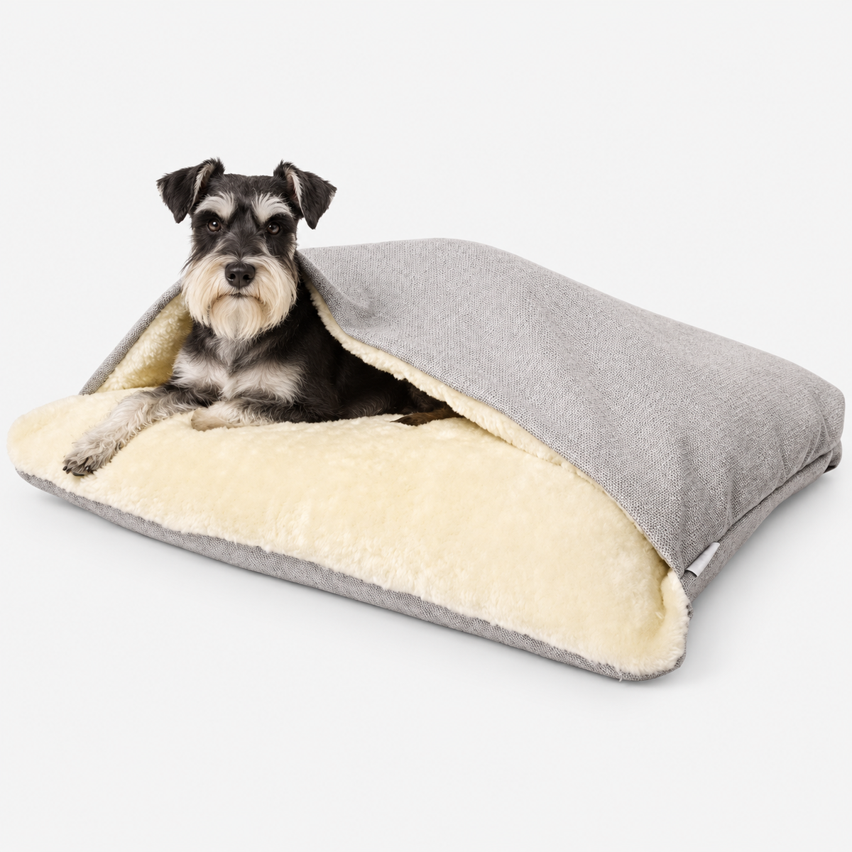 Light grey linen hooded dog bed with a seated miniature schnauzer