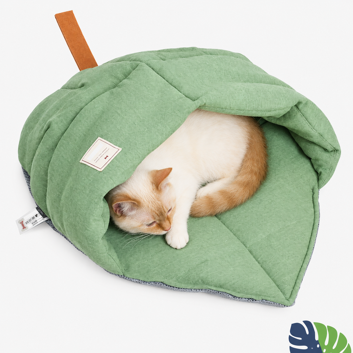 Pet resting inside the hooded leaf bed