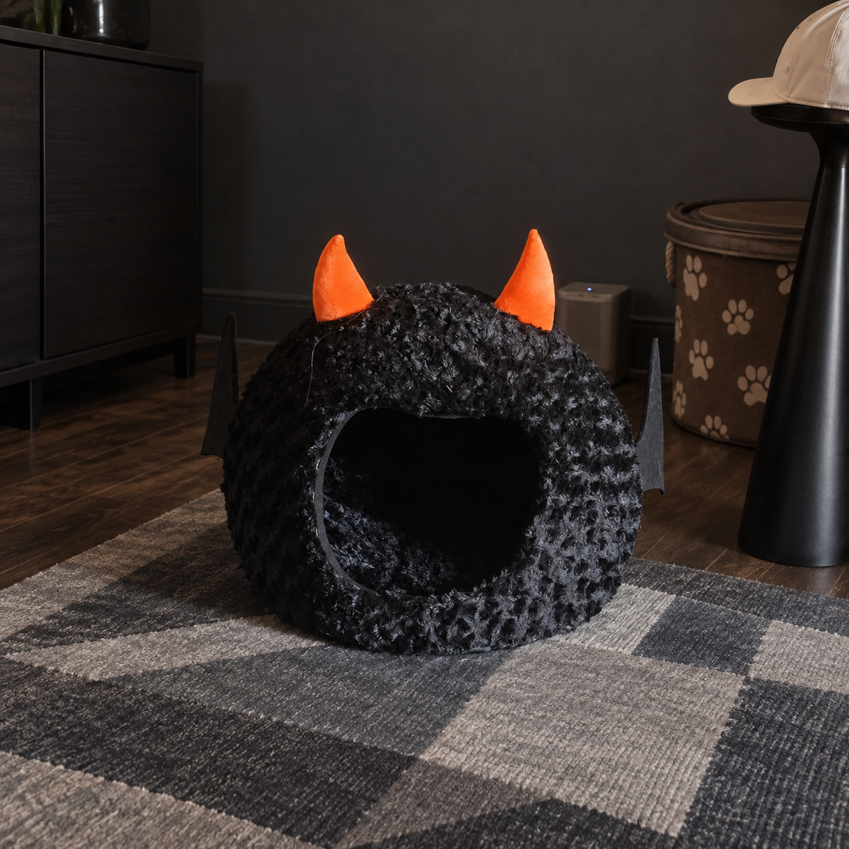 Empty bat pet cave on a geometric rug
