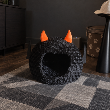 Empty bat pet cave on a geometric rug
