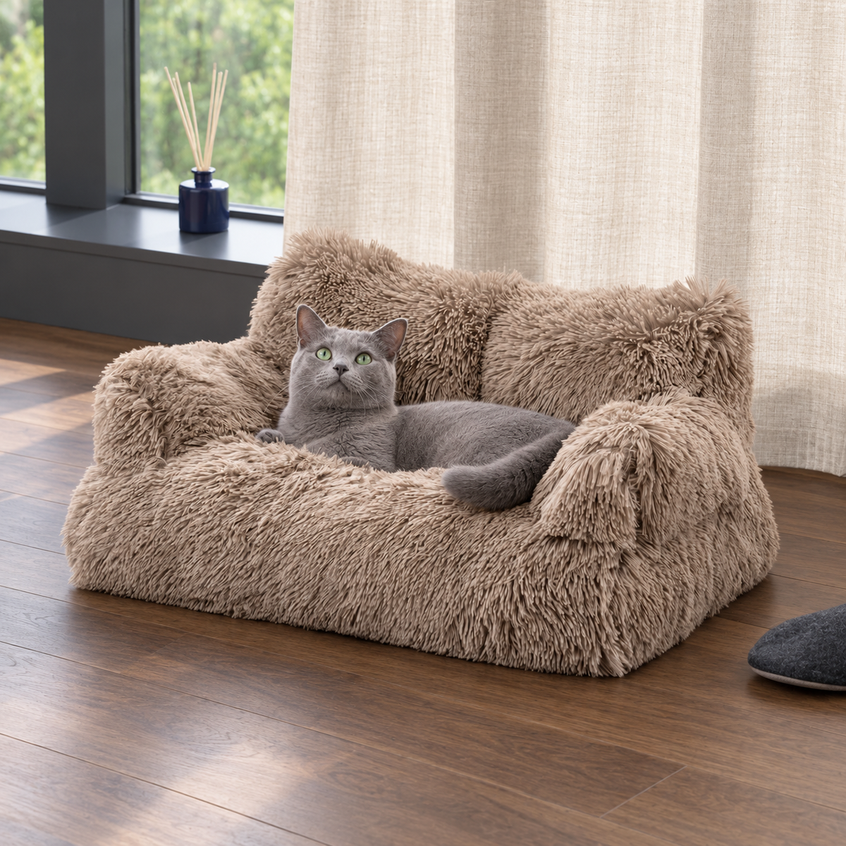 Brown fluffy pet sofa with a relaxed cat by a window
