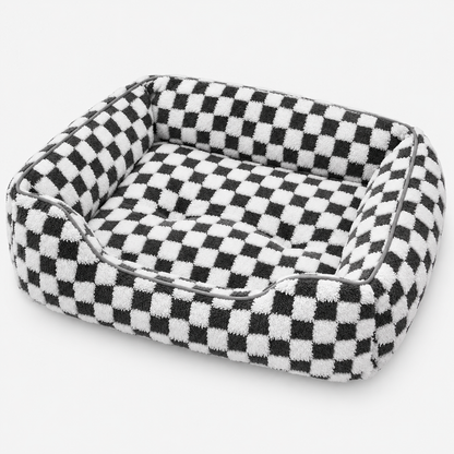 Elevated view of the black and white checked pet bolster bed