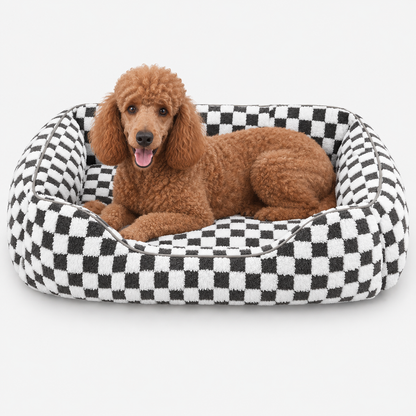 Black checked bolster bed with a red poodle