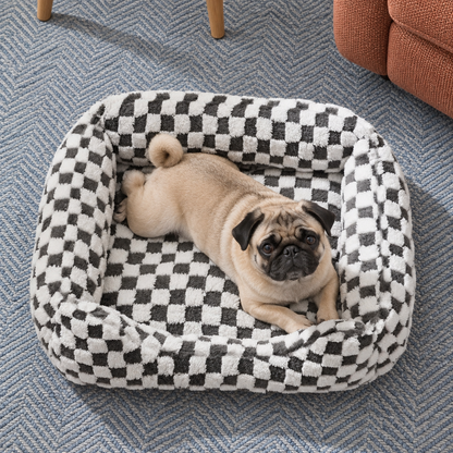 Black checked bolster bed with a pug in a living room