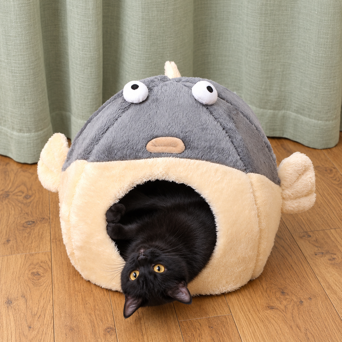 Pet resting upside down inside the pufferfish bed